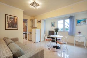 a living room with a couch and a table at Villa Ban in Podgora