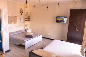 Posteľ alebo postele v izbe v ubytovaní Attico43 Openspace Fronte Mare