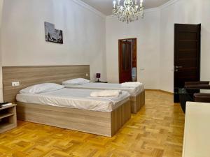 Voodi või voodid majutusasutuse Olive hotel toas