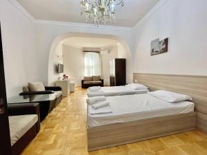 Voodi või voodid majutusasutuse Olive hotel toas