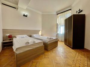 Voodi või voodid majutusasutuse Olive hotel toas