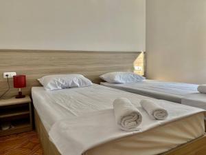 Voodi või voodid majutusasutuse Olive hotel toas