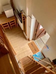 an overhead view of a small room with a kitchen and a room at Brecks Cottage in Newark-on-Trent