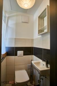 Koupelna v ubytování SunGarden Apartments - hostAID