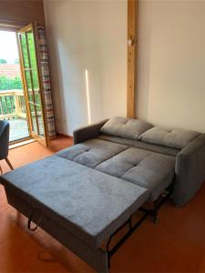 Ein Bett oder Betten in einem Zimmer der Unterkunft Ferienwohnung Landsberg am Lech
