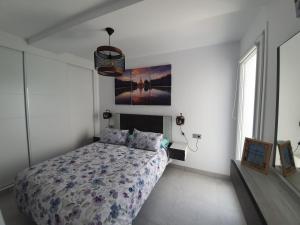 Łóżko lub łóżka w pokoju w obiekcie Bayview Hills - Balcón del Mediterráneo