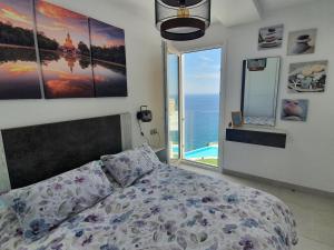 Кровать или кровати в номере Bayview Hills - Balcón del Mediterráneo