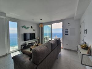Telewizja i/lub zestaw kina domowego w obiekcie Bayview Hills - Balcón del Mediterráneo