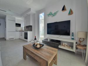 Telewizja i/lub zestaw kina domowego w obiekcie Bayview Hills - Balcón del Mediterráneo