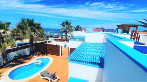 an aerial view of a resort with a swimming pool at Chennai by Privilege Bay in La Oliva