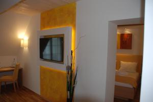 Posteľ alebo postele v izbe v ubytovaní Joglland Hotel Prettenhofer