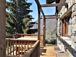 a wooden balcony with a view of the mountains at Maison Mont Rose in Valtournenche