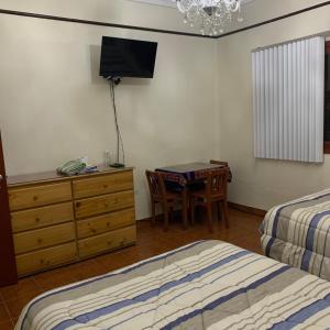 Postel nebo postele na pokoji v ubytování La Chocita Ward