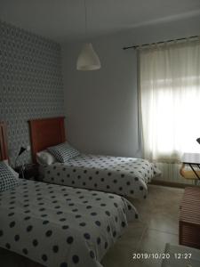 Postel nebo postele na pokoji v ubytování Alojamiento VuT Rupurupay A + 4 fotografie