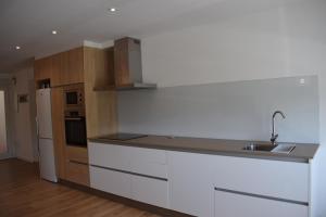 Kuchyň nebo kuchyňský kout v ubytování Nuevo apartamento céntrico junto al mar