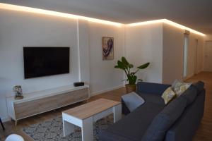 TV a/nebo společenská místnost v ubytování Nuevo apartamento céntrico junto al mar