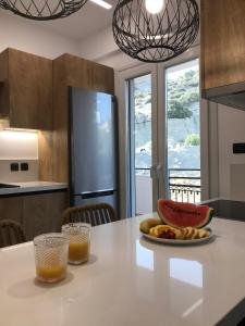 Kuchyň nebo kuchyňský kout v ubytování blue sea suites