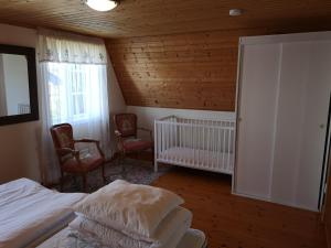 Ένα ή περισσότερα κρεβάτια σε δωμάτιο στο Wannborga Vingård