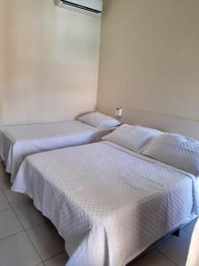 Postel nebo postele na pokoji v ubytování Sultan Palace Hotel