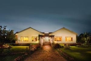 Zahrada ubytování ama Stays and Trails Nine Palms Alibag + 6 fotografií