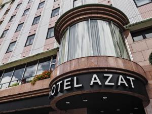 a sign on the front of a hotel zetteraz building at Hotel Azat Naha in Naha