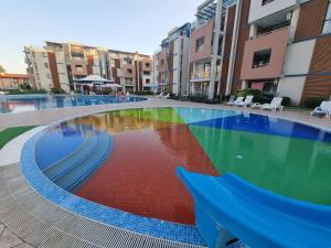 The swimming pool at or close to Studio Apartment with balcony 300m from beach