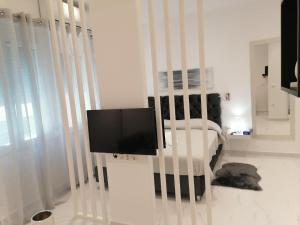 Posteľ alebo postele v izbe v ubytovaní The Syntagma Luxury Suite