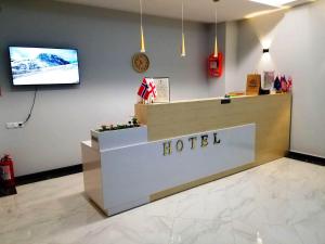 Uma televisão e/ou sistema de entretenimento em Vita Gardenia Hotel Tskaltubo