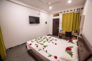 Voodi või voodid majutusasutuse Dhangethi INN toas