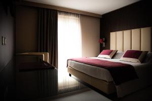 Postel nebo postele na pokoji v ubytování Hotel Ansharius - Adults only