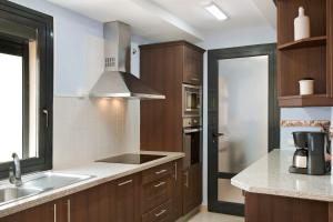 A kitchen or kitchenette at Villa Pueblo Don Thomas