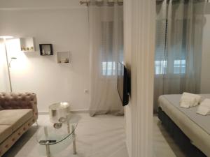 Posteľ alebo postele v izbe v ubytovaní The Syntagma Luxury Suite