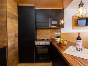 A kitchen or kitchenette at Swimsuit Friendly Holiday Home
