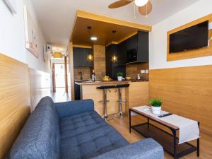A kitchen or kitchenette at Swimsuit Friendly Holiday Home