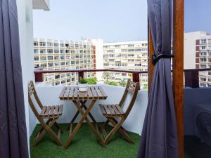 A balcony or terrace at Swimsuit Friendly Holiday Home