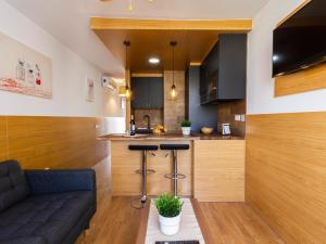 A kitchen or kitchenette at Swimsuit Friendly Holiday Home