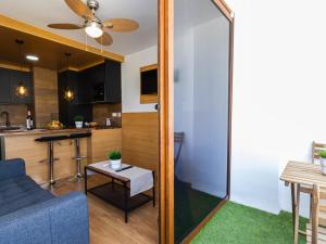 A kitchen or kitchenette at Swimsuit Friendly Holiday Home