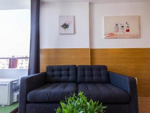 A seating area at Swimsuit Friendly Holiday Home