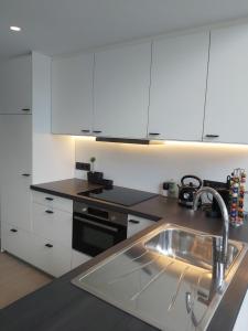 Dapur atau dapur kecil di Vakantiewoning Hélence