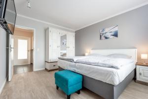 Postel nebo postele na pokoji v ubytování Seegarten Appartements Büsum + 30 fotografií