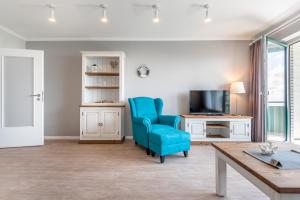 TV a/nebo společenská místnost v ubytování Seegarten Appartements Büsum