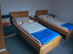 Postel nebo postele na pokoji v ubytování Chata Jamy + 2 fotografie
