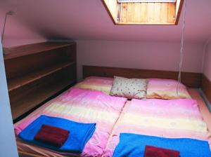 Postel nebo postele na pokoji v ubytování Chata Jamy