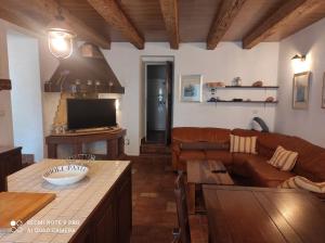 a living room with a couch and a table at House Vodice in Vodice