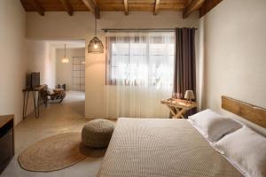 Posteľ alebo postele v izbe v ubytovaní Aletri Swim Up Boutique Hotel