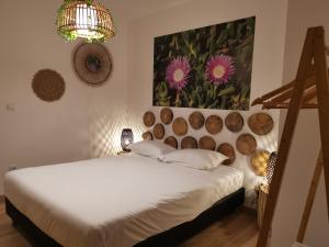Ένα ή περισσότερα κρεβάτια σε δωμάτιο στο Atlantic Nature Beach House