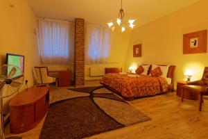 Postel nebo postele na pokoji v ubytování Enjoy Inn