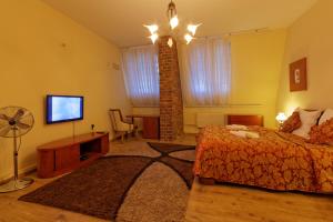 Postel nebo postele na pokoji v ubytování Enjoy Inn