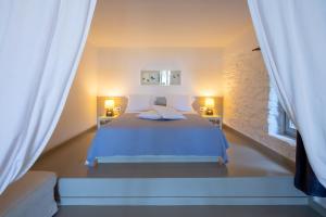 Postel nebo postele na pokoji v ubytování Kea Village Suites & Villas + 37 fotografií