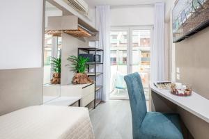 TV a/nebo společenská místnost v ubytování Hotel Pigalle